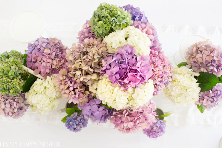 This 5 Minute Summer Centerpiece is so simple and quick and if you use the hydrangeas from your garden and this floral bouquet will costs pennies to create.