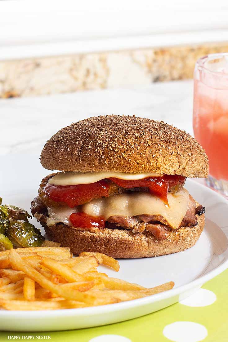 This easy Chicken Teriyaki Grilled Burgers recipe is inspired by Red Robin's burger. The chicken is topped with pineapple and cheese which makes it yummy. #burger #bbq #recipes