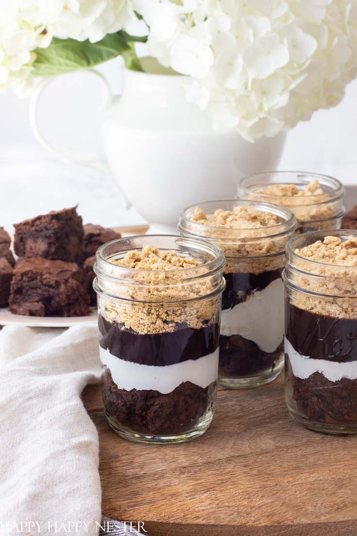Need a tasty treat? This S'mores Recipe in a Jar is a yummy choice if you want a different version of a s'more. No need to roast your marshmallows. #s'mores #s'moresrecipe #desserts #chocolatebrownies #chocolatedesserts