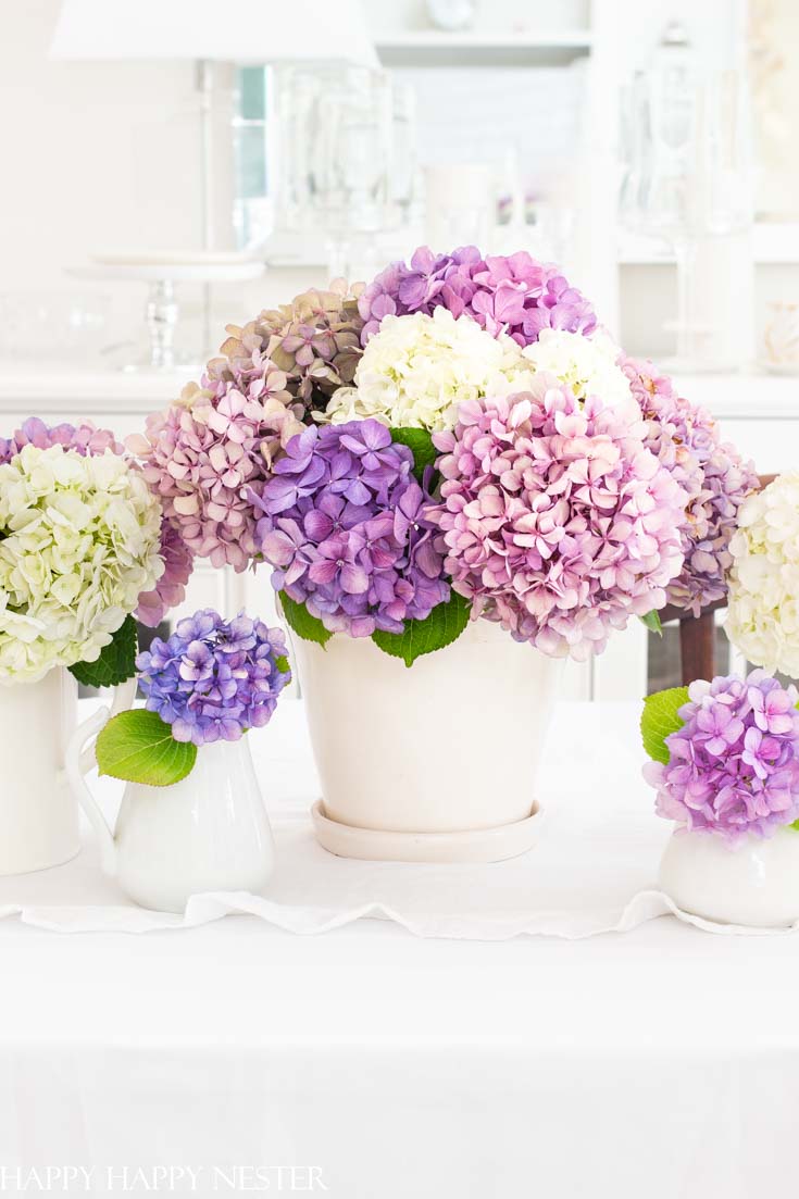 This 5 Minute Summer Centerpiece is so simple and quick and if you use the hydrangeas from your garden and this floral bouquet will costs pennies to create.