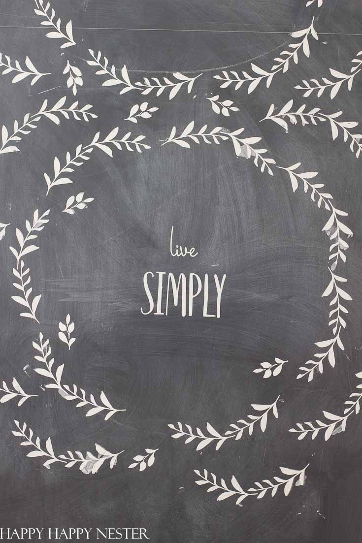 This chalkboard design utilizes A Makers' Studio stencils and paint. They make it easy to create art for your chalkboard. #chalkboard #artwork #stencils #chalkart