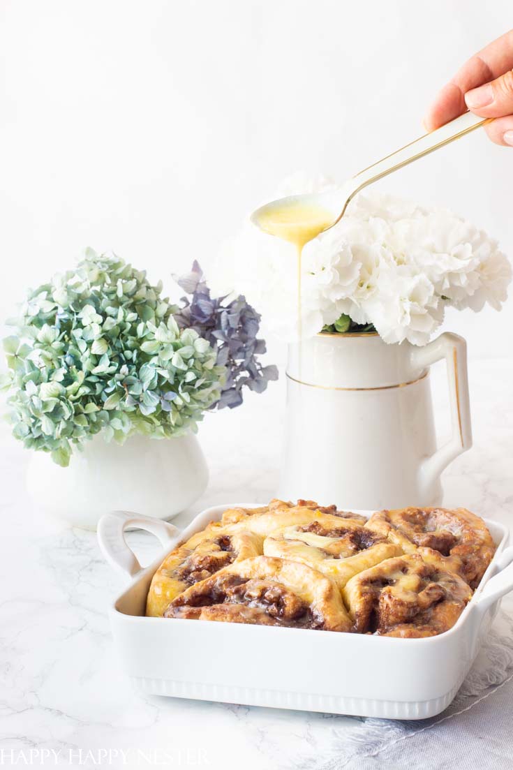 These wonderful Homemade Orange Sweet Rolls are so easy to make, and they require no yeast. This recipe is inspired by Joanna Gaines Magnolia Table Cookbook and Cook Illustrated Cookbook. #baking #sweetrolls #Magnoliatablecookbook #Joannagaines #cinnamonrolls