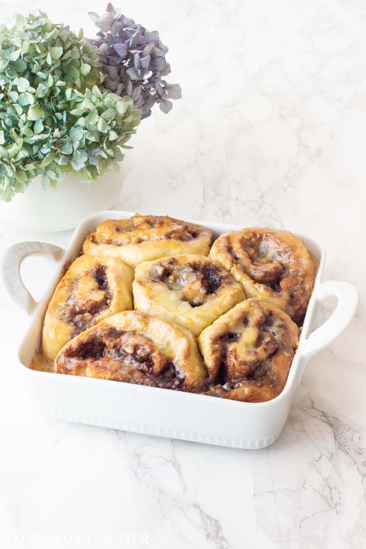 These wonderful Homemade Orange Sweet Rolls are so easy to make and they require no yeast. This recipe is inspired by Joanna Gaines Magnolia Table Cookbook. #baking #sweetrolls #Magnoliatablecookbook #Joannagaines #cinnamonrolls