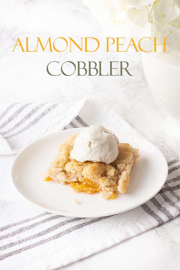 This Peach Cobbler with Almond Cookie Dough is a delightful and subtle blend of almond and peaches. It is a new twist to a summer dessert of fresh fruit. #peachcobbler #recipe #desserts #freshfruitrecipe