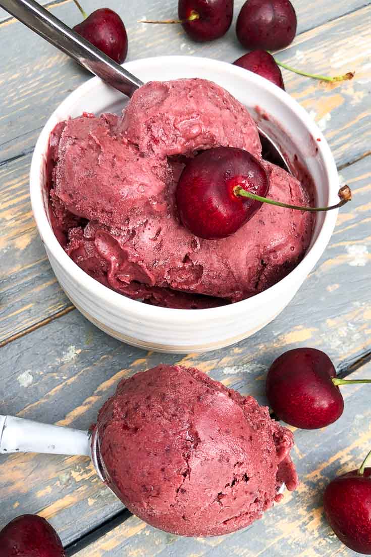 This cherry vanilla homemade ice cream is the best. It has fresh cherries which add a sweet yet tangy flavor. Check out this recipe and many more in this ice cream roundup. #icecream #recipes #desserts #cherrydesserts