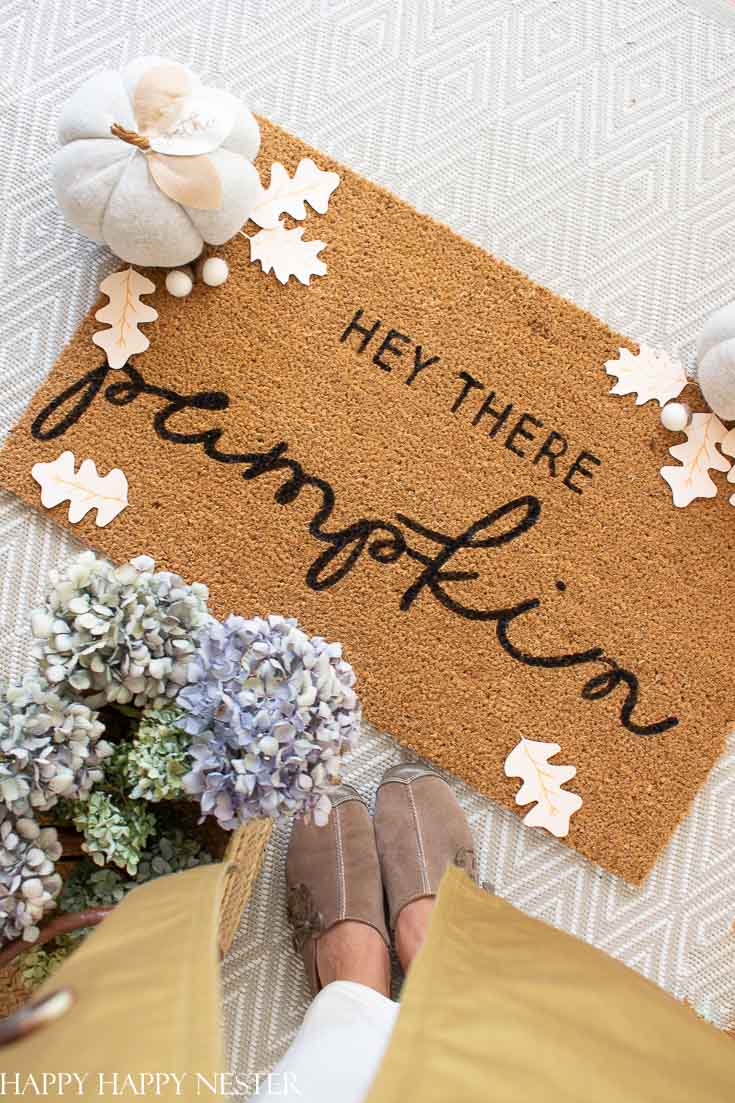 Have you ever wondered How to Stencil a Cute Doormat? I was surprised by how easy they are to stencil. Once you have the stencil, it takes minutes to paint. And this post includes a free stencil printable. #stencil #falldoormat #cutedoormat #craft #craftproject