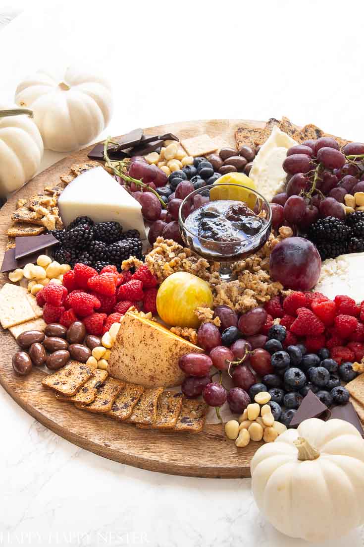 Charcuterie boards are the best for display appetizers. Pick out a round, square or rectangular, one and then build all your food on it. Choose to make a cheese, fruit, meat, cheese, or even a dessert board. They are perfect for a big crowd of friends or family. You'll never run out of great appetizers to add to your board. #charcuterieboards #entertaining #partyappetizers #appetizers #appetizerdiy