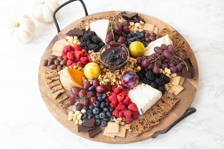 Need some Easy Appetizer Ideas for a Party, then you'll want to view this step by step tutorial. It shows how to build a fruit, cheese charcuterie board. #charcuterieboards #entertaining #partyappetizers #appetizers #appetizerdiy