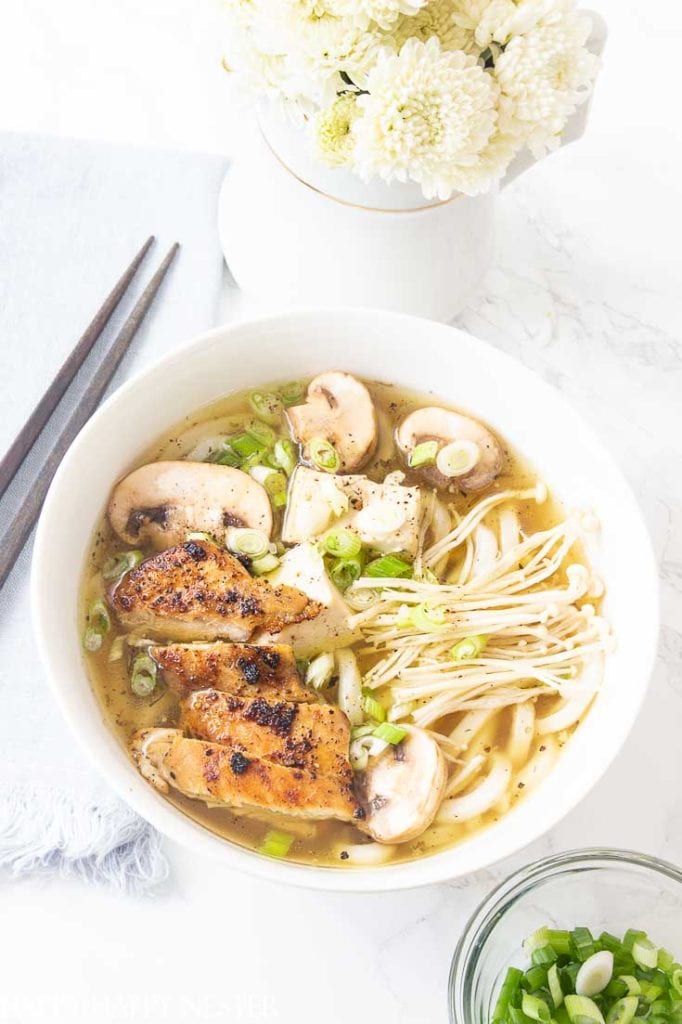 a bowl of japanese udon which is part of a collection of the best winter recipes roundup