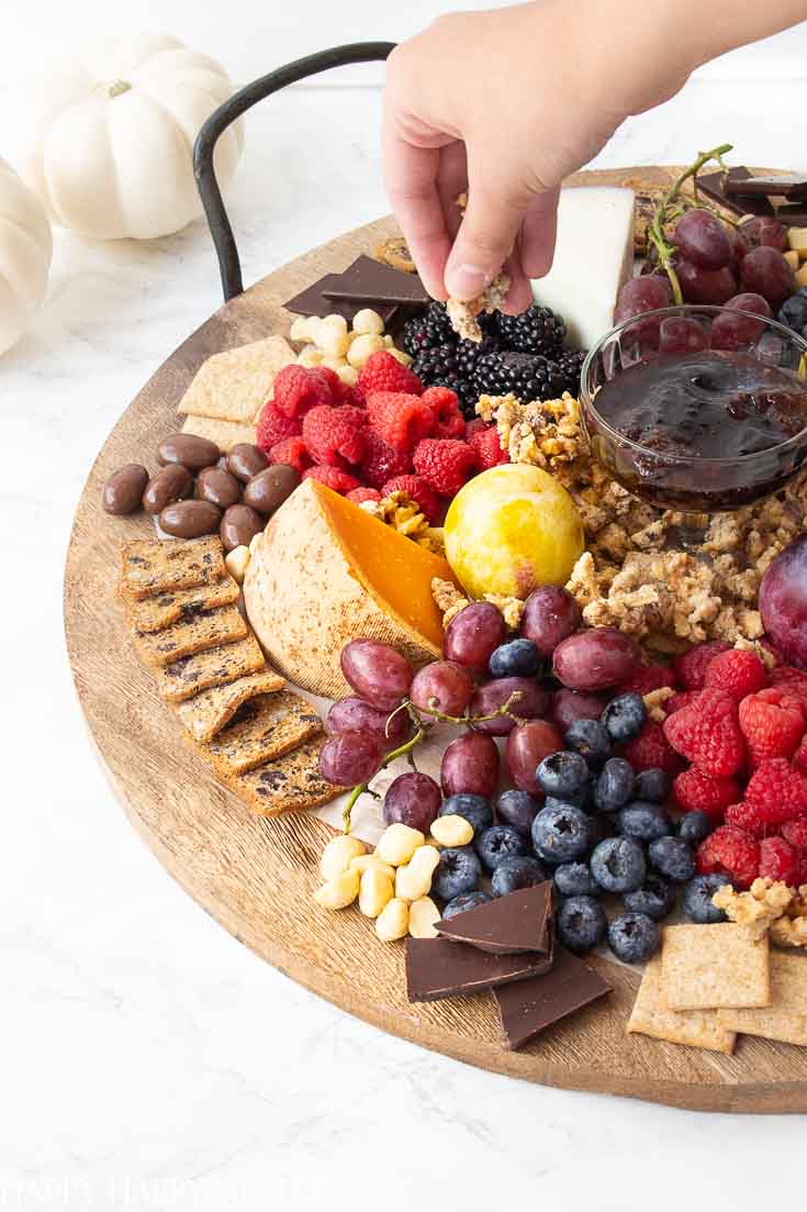 Charcuterie boards are the best for display appetizers. Pick out a round, square or rectangular, one and then build all your food on it. They are perfect for a big crowd of friends or family. You'll never run out of great appetizers to add to your board. #charcuterieboards #entertaining #partyappetizers #appetizers #appetizerdiy