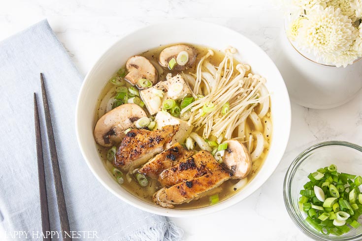 This Homemade Chicken Noodle Soup goes beyond the traditional recipe. It uses the delicious Japanese Udon Noodles that make this broth utter perfection. #chickennoodlesoup #soup #udon #japanesecuisine