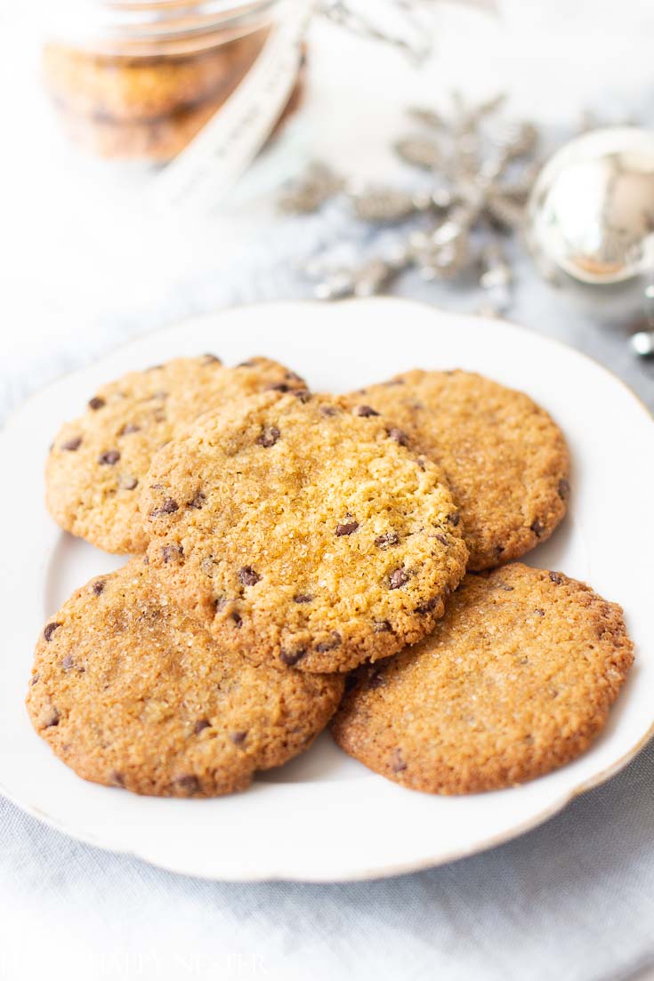 If you like a crispy and chewy cookie, then you'll love this Chocolate Chip Cookie Recipe, this is a thin, crispy cookie that is easy to make and so yummy. Make sure to try this thin perfect cookie. #cookie #cookierecipe #christmascookie