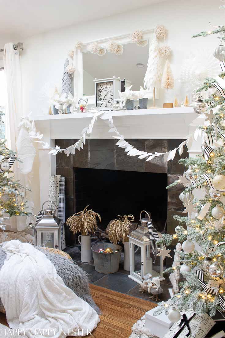 This post is all about Mantel Decor For Christmas. 41 bloggers are sharing their mantels for the holidays. It is a great collection of winter mantels. #decor #holidaydecor #christmasmantel #howtodecorateamantel #manteldecor