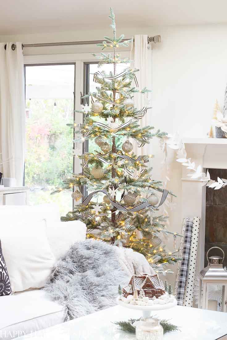 This Balsam Hill Tree is made so well. Make sure to read this post before you purchase your tree. It is a big investment and you'll want to be informed before you buy a tree. #balsamhilltree #christmastreereview #treereview #fauxchristmastree
