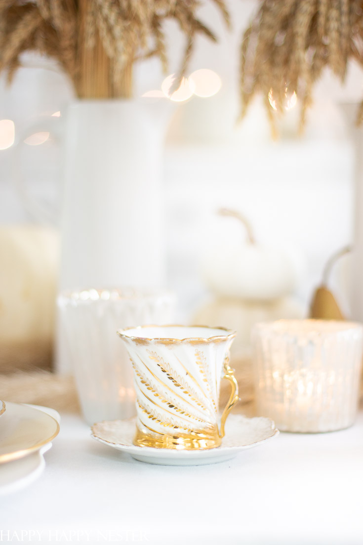 Pull out your table decor when setting your Fall Table. Here are a thriftshop teacup and white crystal candle votives. shop your home for elements. #tabledecor #tablesetting #thanksgiving #wheat