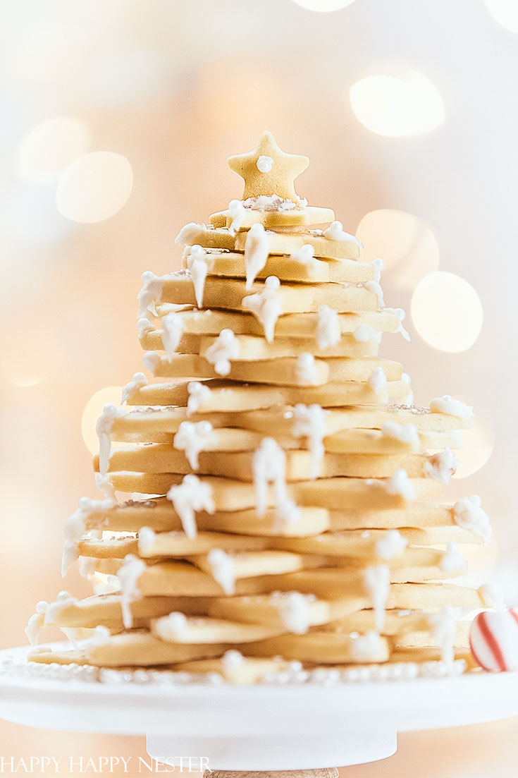 This yummy sugar Christmas cookie recipe is the perfect cookie for creating this fun tree. Learn how to make this impressive dessert for a special dinner party or as a hostess gift. This special treat will impress your family and friends! #christmasbaking #baking #cookies #christmascookies #sugarcookies