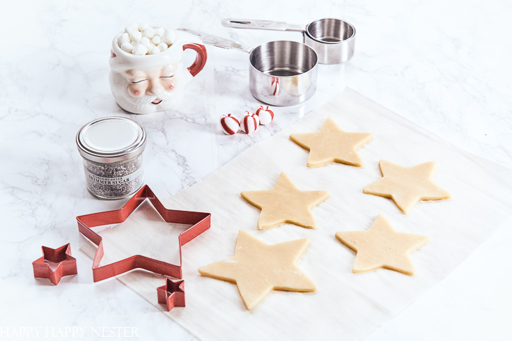 Learn how this Christmas cookie recipe is the best cookie for creating a fun and pretty cookie tree. #surlatable #christmascookies #sugarcookierecipe #cookierecipe #cookietree