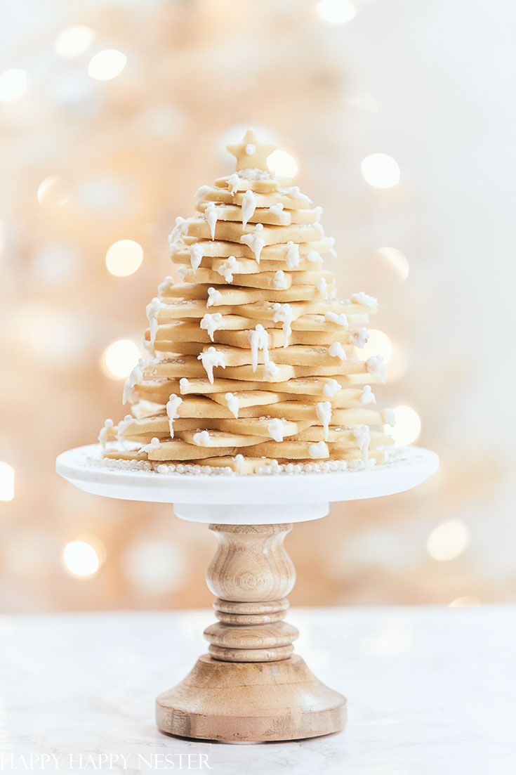 This sugar Christmas cookie recipe is the perfect cookie for creating this fun tree. Make this impressive dessert for a special dinner party or as a hostess gift. This special treat will impress your family and friends! #christmasbaking #baking #cookies #christmascookies #sugarcookies