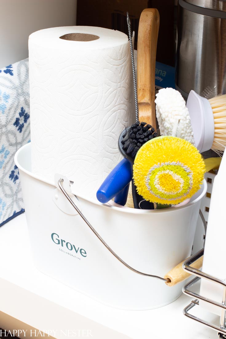 under the sink organisation - love the idea of paper towel holder