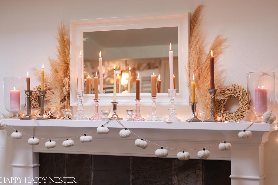 decorate your fall mantel with candles and pampas grass