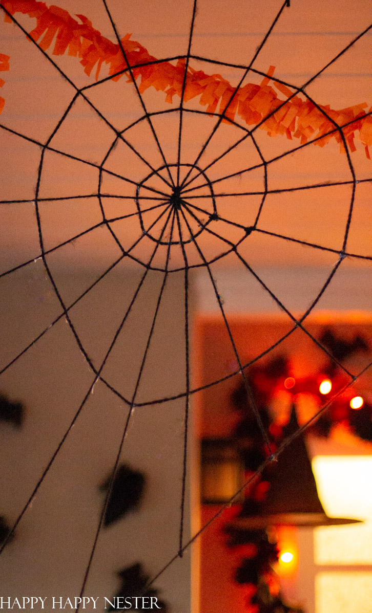 make a spooky giant spider web