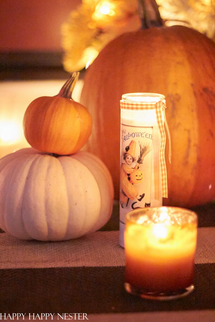 Use candles to warm up your Halloween decor