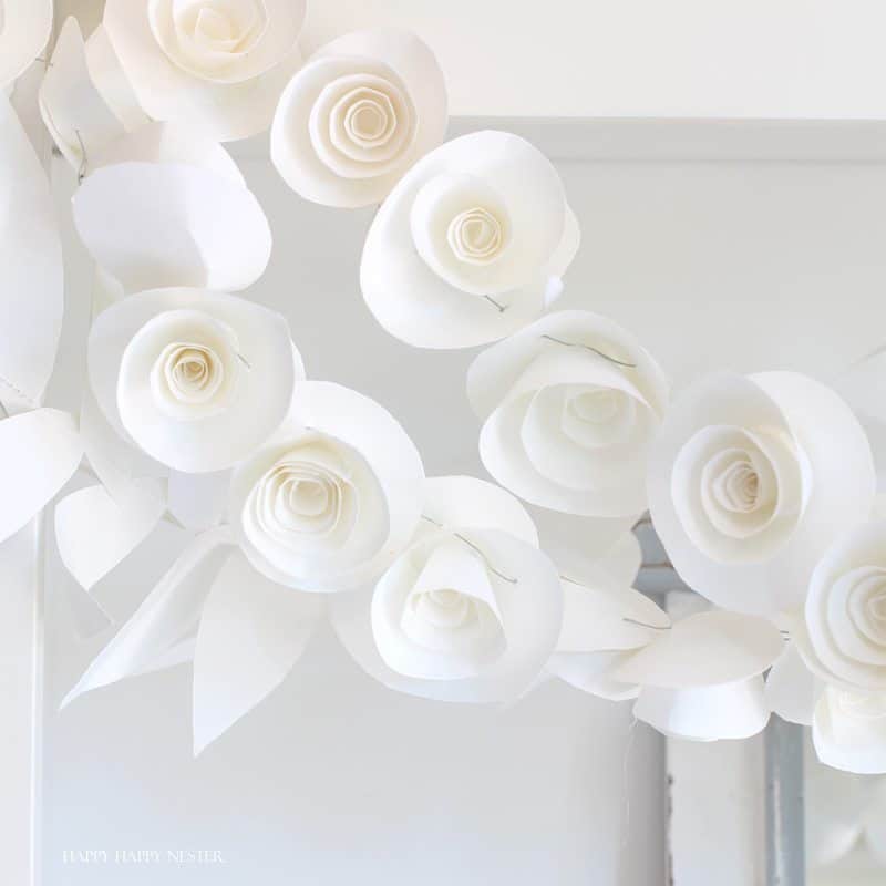 Garland of handmade white paper roses