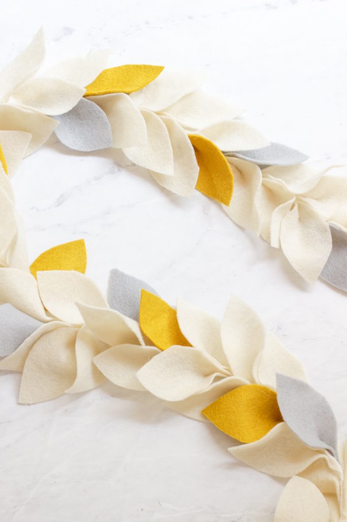 Felt leaf garland in cream, mustard yellow, and light gray
