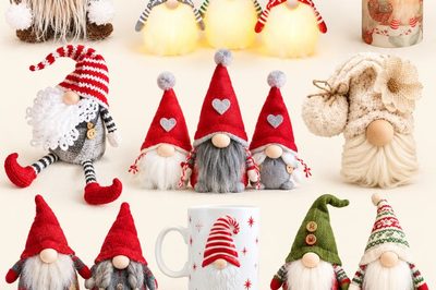 A collection of Christmas gnome decor, including plush figurines, a lit candle, a coffee mug, and a hanging garland.