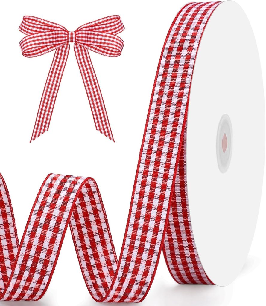 A spool of red and white gingham ribbon is shown, with a length of ribbon unrolled and a matching bow displayed above it—perfect for adding a festive touch to your red and white Christmas tree.