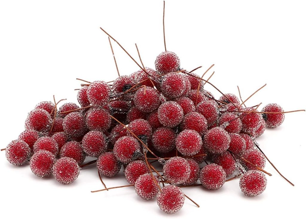 A pile of small, red, frosted artificial berries with thin brown stems, arranged on a white background—perfect as a festive accent for your red and white Christmas tree.