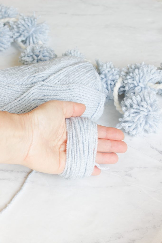 make this inexpensive yarn garland