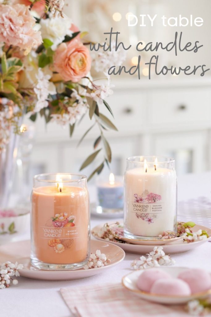 table decorations with candle and flowers pinterest image