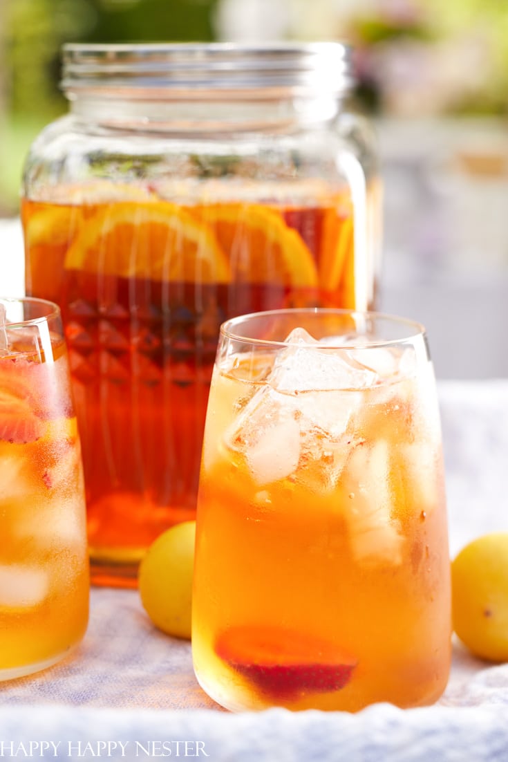 https://happyhappynester.com/wp-content/uploads/2022/05/how-to-make-sweet-sun-tea-2.jpg