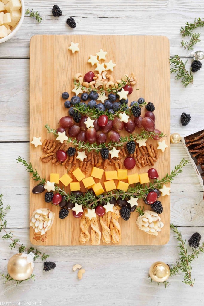 christmas charcuterie boards and this one is shaped into a christmas tree