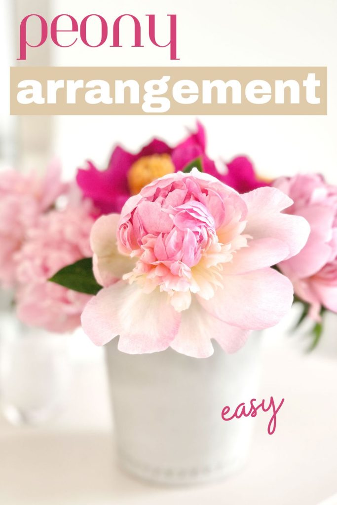 pin image with a white vase filled with a bouquet of pink and bright red peonies
