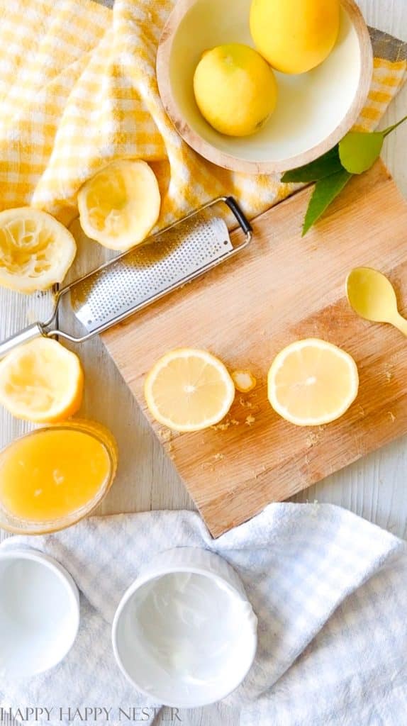 lemons cut on a wooden cutting board