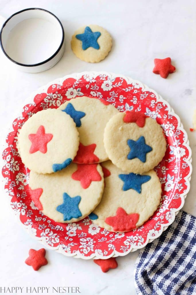 round scalloped sugar cookies with red and blue 4th of july stars