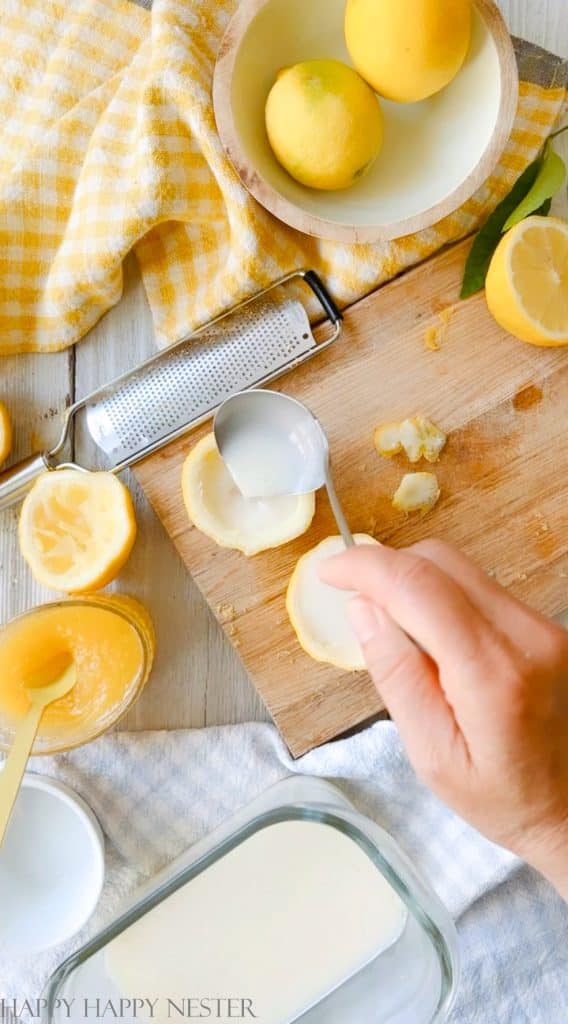 pouring mixture into lemon shells