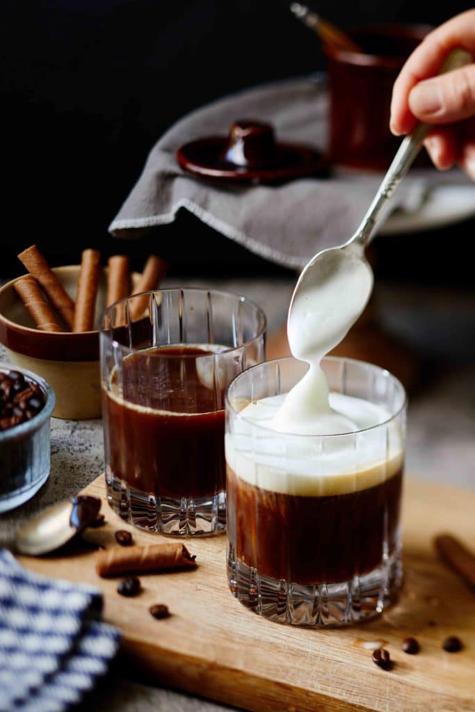 Add a dollop of frothed milk to the coffee drink