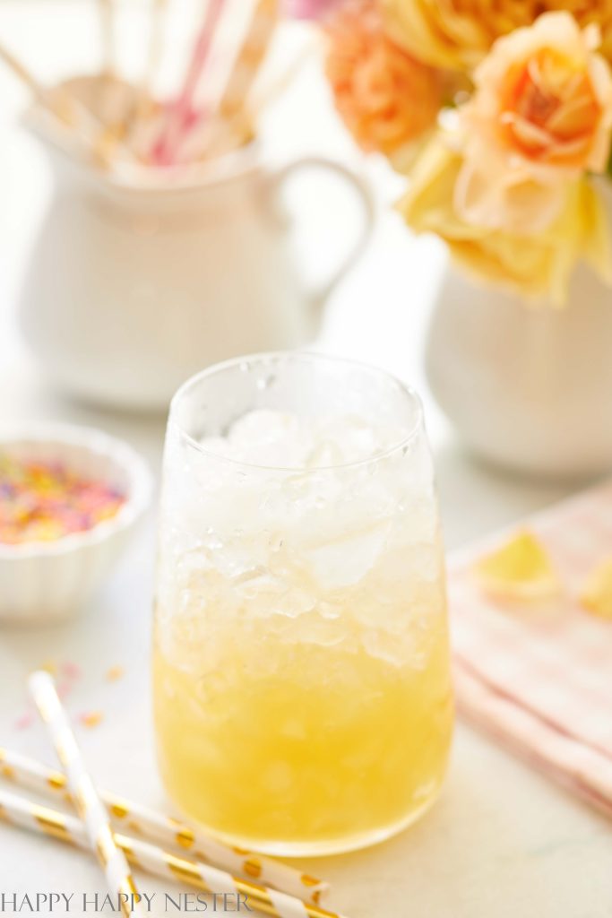 a glass with crushed ice and pineapple juice
