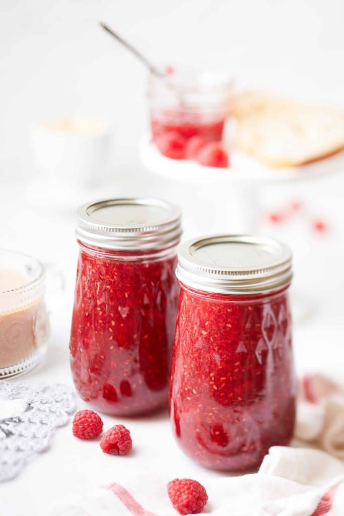 photo of two jars for raspberry freezer jam