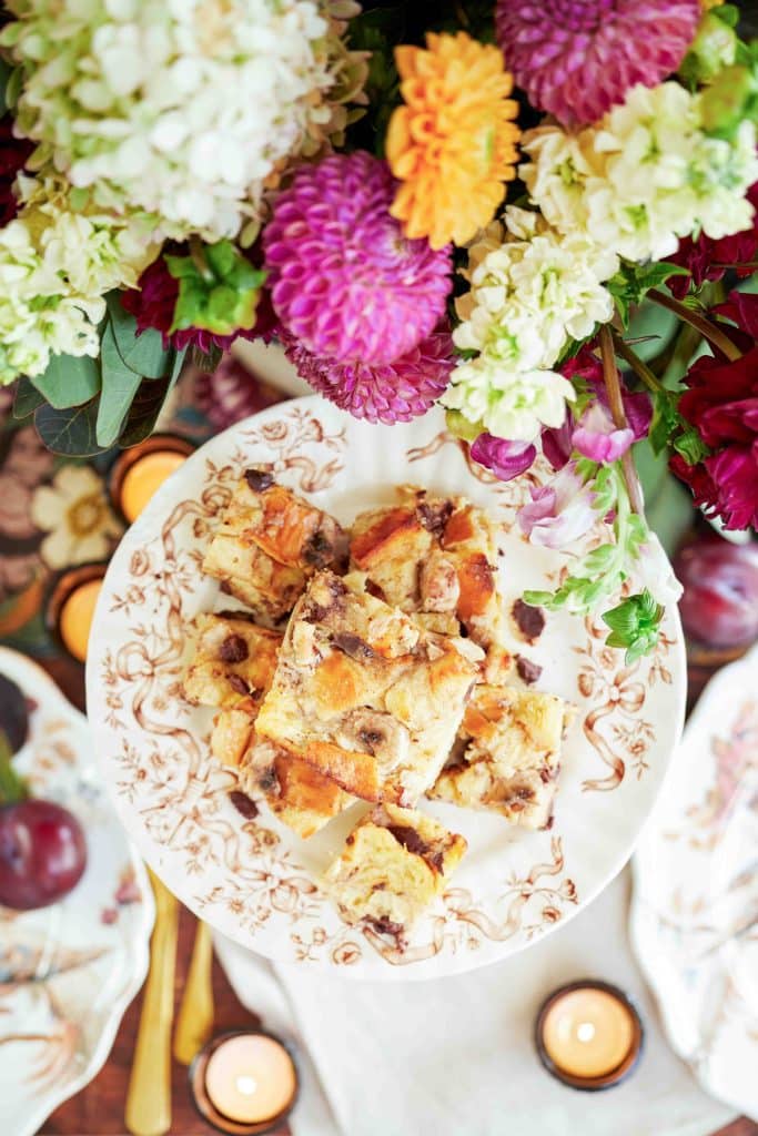 A plate of bread pudding on a vintage brown plate