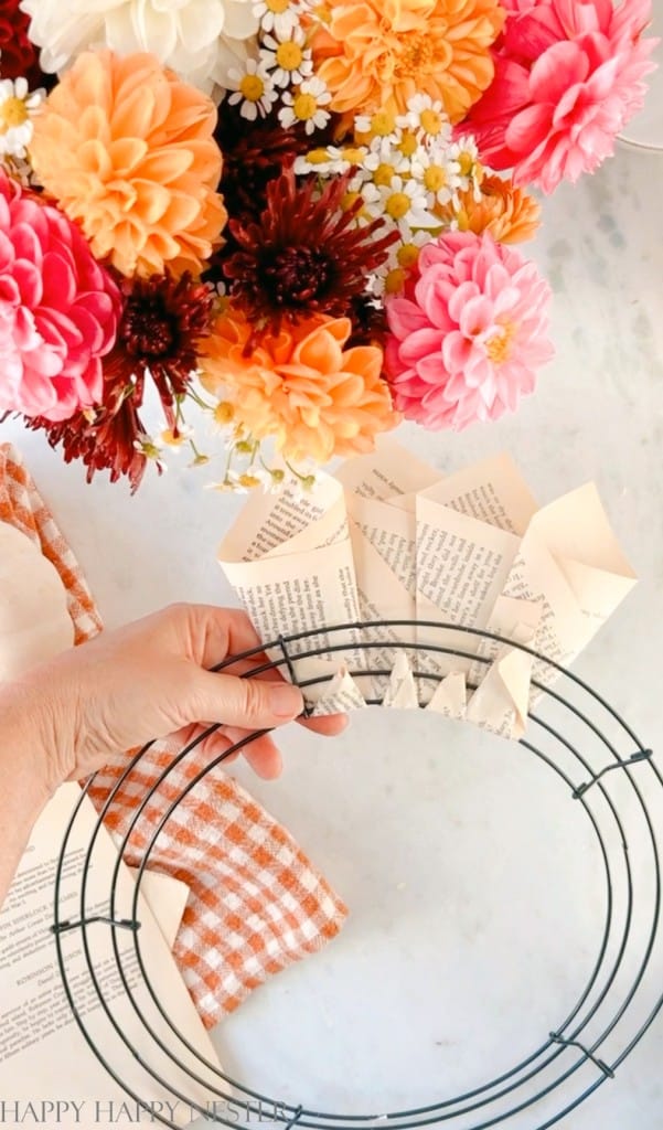 how to make a book wreath and gluing the back of the wreath