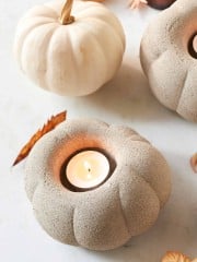 Cement Pumpkins DIY (with Candleholders) a close up of a candle holder made out cement and shaped like a pumpkin