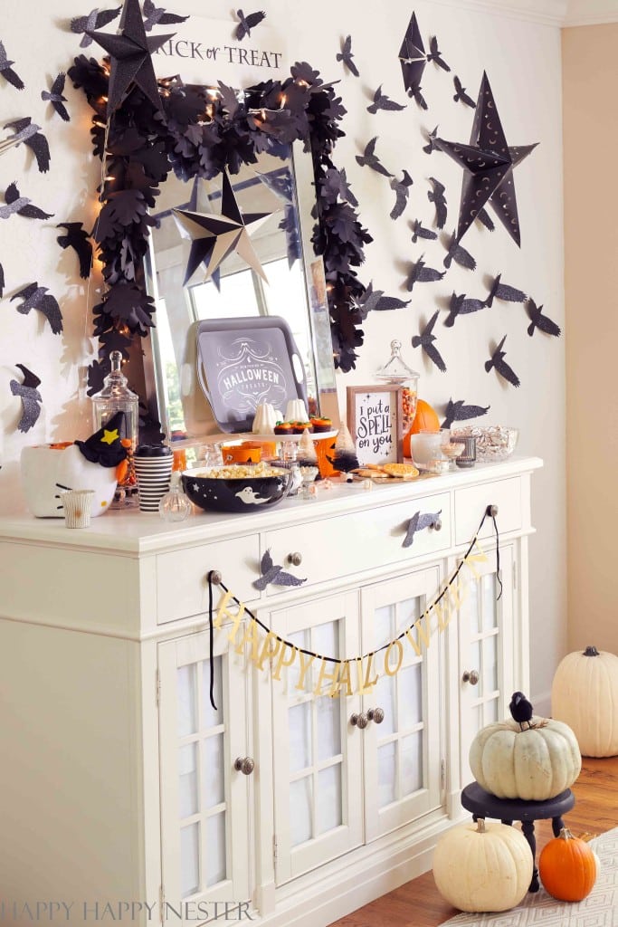 Halloween dessert table ideas with a buffet table in a dining room
