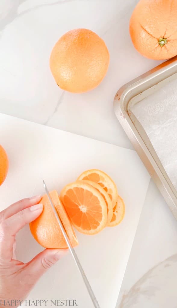 slicing oranges for a wreath