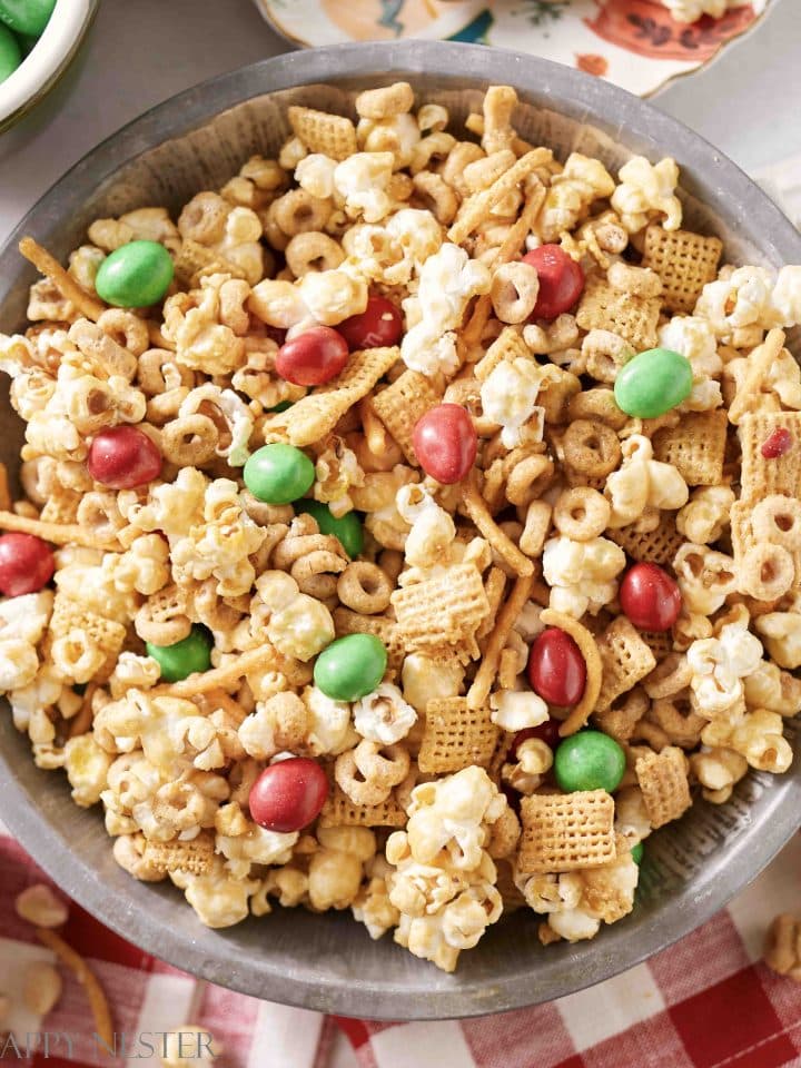 caramel chex mix recipe in a tin pan on a table
