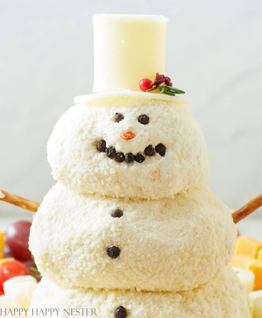Easy snowman cheeseball recipe for a charcuterie board