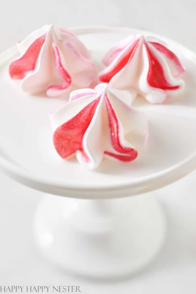 a close up of meringue cookies that are vegan